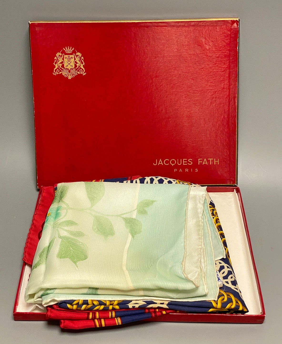 A 1960's Jacques Fath, Paris scarf with original box together with a Hermes Maillon scarf